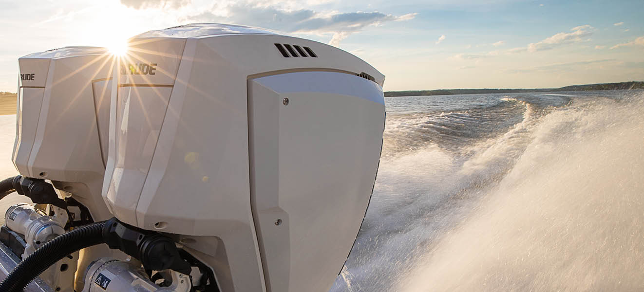 Two Evinrude outboard motors on a boat in action