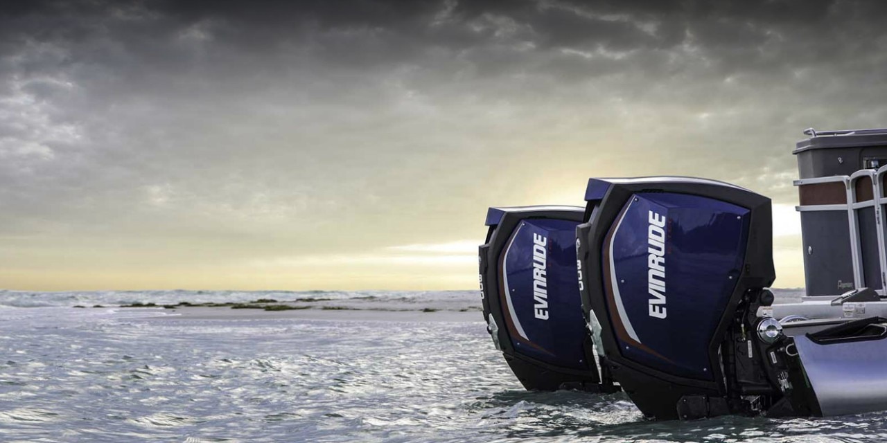 Two Evinrude outboard motors on a pontoon boat